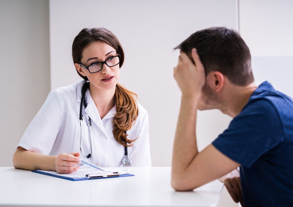 doctor discussing discontinuation of benzodiazepine medications and expected withdrawal symptoms with patient