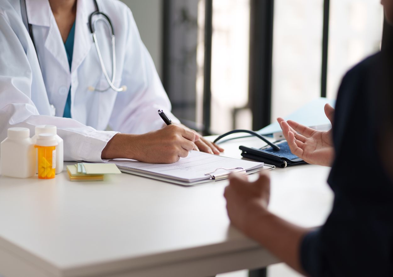 doctor speaking with patient who is struggling with addiction and dependence on prescription medications